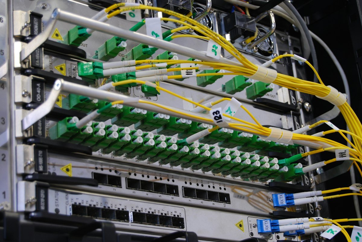 Fiber optic cables connected to network equipment